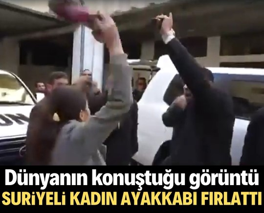 Dünyanın konuştuğu görüntü: Suriyeli kadın, ayakkabısını fırlattı!